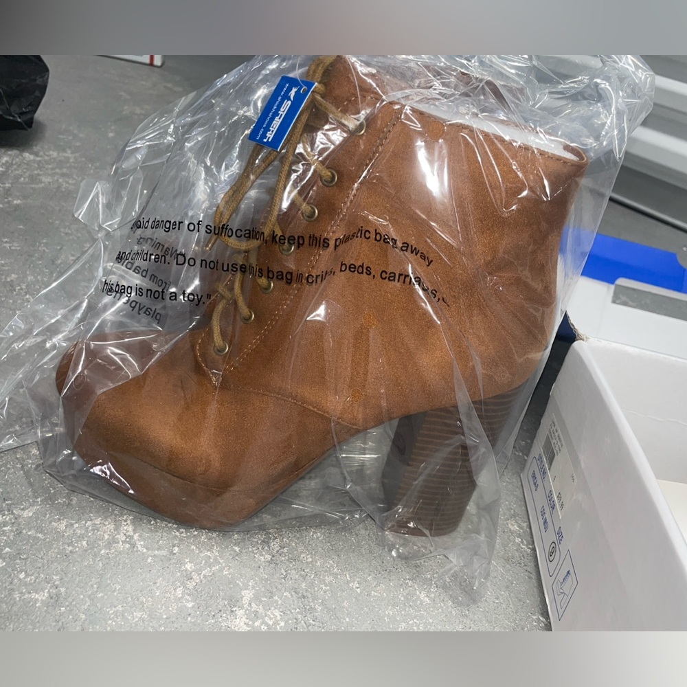 NWT brown laced up booties size 9 , suede like material from shiekh